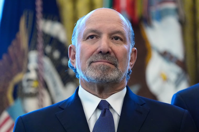 U.S. Commerce Secretary Howard Lutnick listens during an event with President Donald Trump in the Oval Office this month.