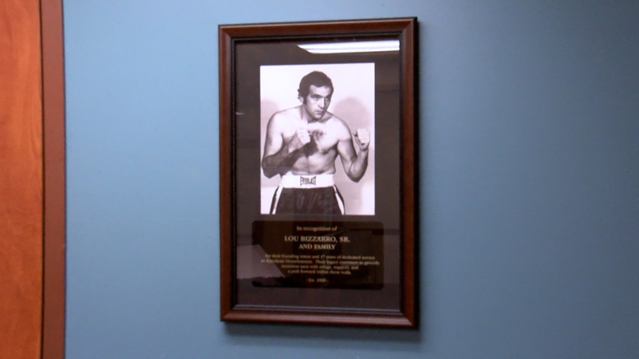 Erie City Mission honors Lou Bizzarro, family with plaque