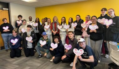 ‘Amor Omnia Vincit,’ Hawk Hill Provost Jean McGivney-Burelle, PhD enjoys convivial moments with SJU Latin students