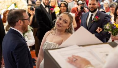 Julia Allison tears up as she marries Tim Vogel of Manayunk at the Reading Terminal Market on Valentine's Day in Philadelphia, Pa., Saturday, Feb. 14, 2026.