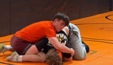 Bethlehem High School senior James Nalbone practices wrestling from the top position