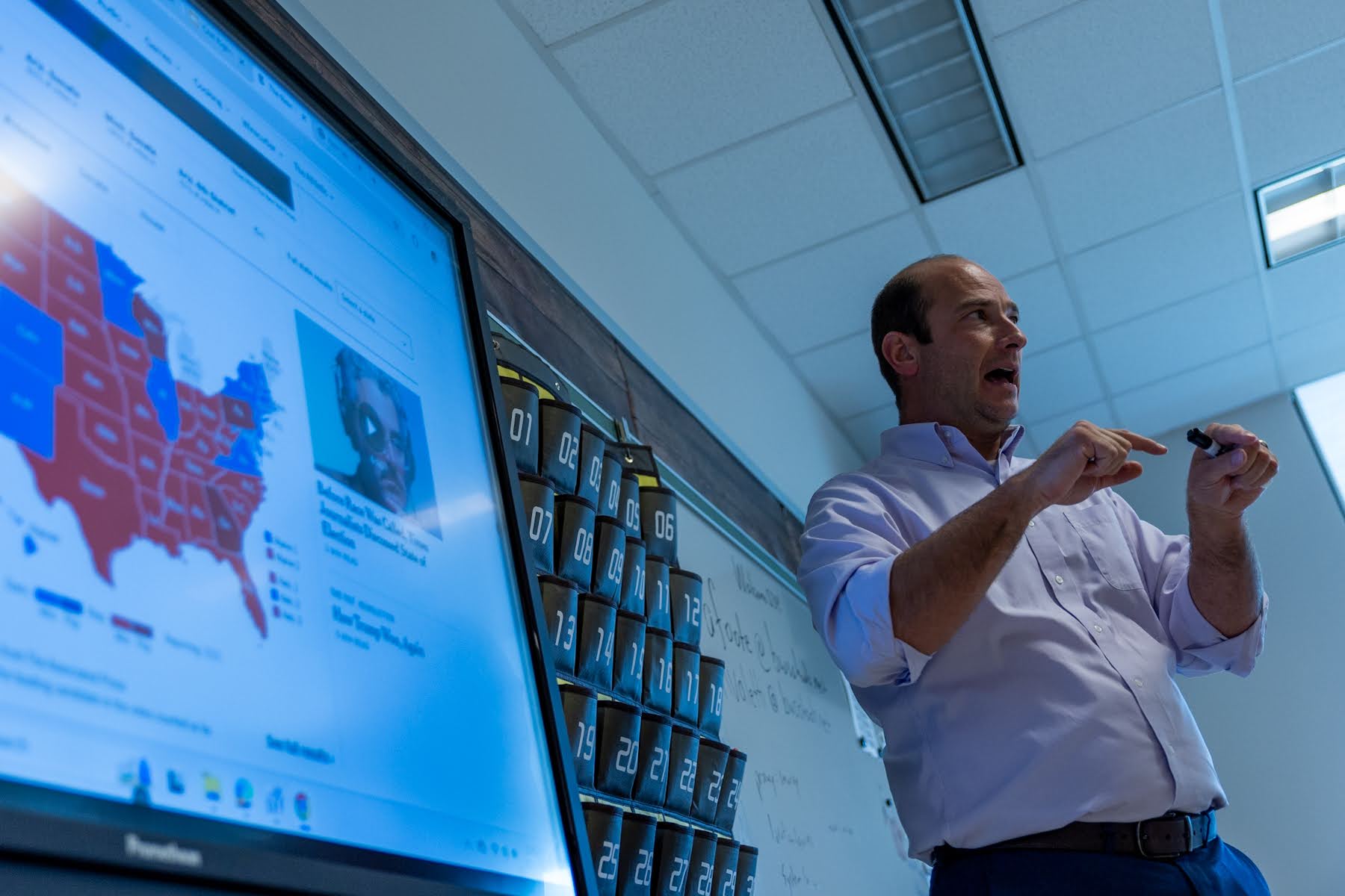 A person teaches their 11th grade media literacy class with regard to the election results on Nov. 6th at Baldwin High School. (Photo by Cameron Croston/PublicSource)