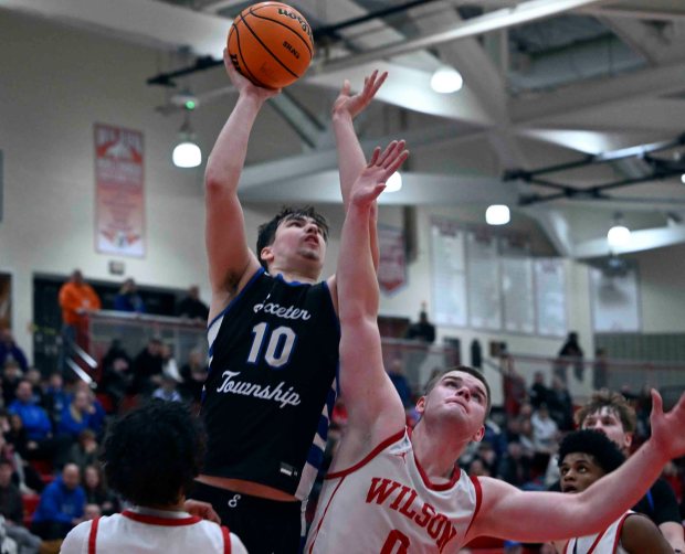 Exeter's Braylon Reinert puts in two of his 11 points against Wilson in a 43-41 Eagles' BCIAA quarterfinal victory over the Bulldogs on Monday, Feb. 9, 2026, at West Lawn. (BILL UHRICH/READING EAGLE)