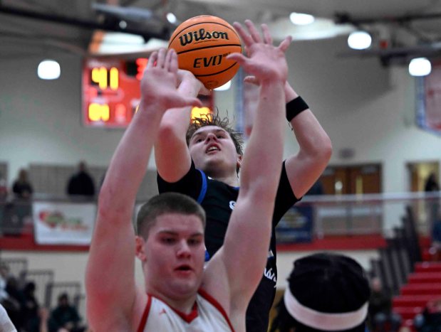 Exeter's Aiden Dauble scores the game-winning basket with 1.1 seconds remaining against Wilson in a 43-41 Eagles' BCIAA quarterfinal victory over the Bulldogs on Monday, Feb. 9, 2026, at West Lawn. Dauble had a team-high 16 points. (BILL UHRICH/READING EAGLE)