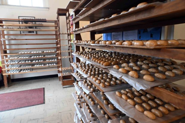 Peanut butter Easter eggs cool before being coated in chocolate at Schwarzwald United Church of Christ in Exeter Township. (BILL UHRICH/READING EAGLE)