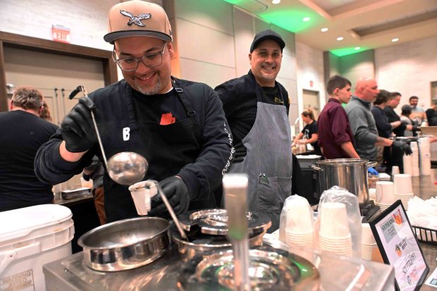 Carlos Belilla from Tec Centro ladles out some black bean soup to be served with coconut bread at the 24th annual Souper Bowl to benefit Opportunity House at the DoubleTree by Hilton hotel, 701 Penn St., on Monday, Feb. 2, 2026. (BILL UHRICH/READING EAGLE)