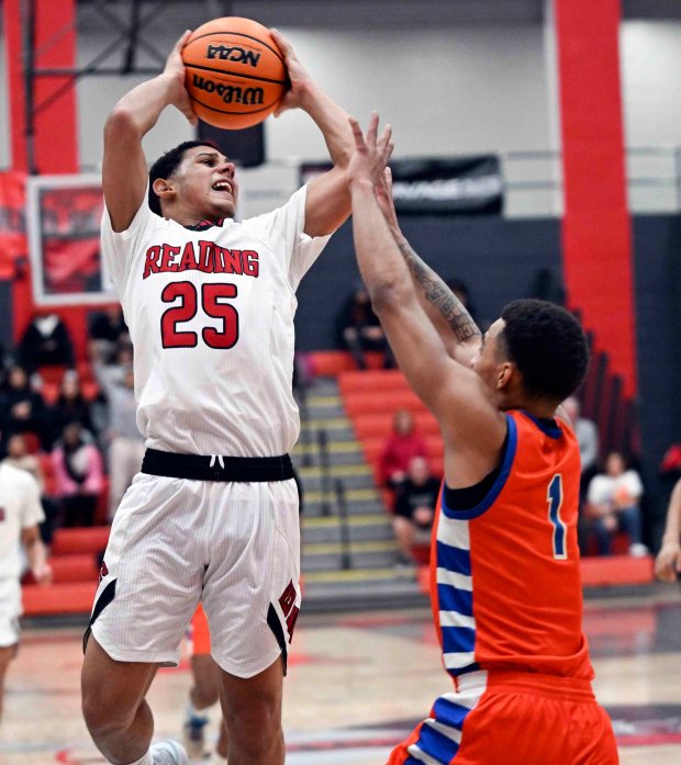 Reading High's Rabin Rubio hits two of his 14 points against York in an 86-69 District 3 Class 6A Red Knight loss to the Bearcats on Tuesday, Feb. 17, 2026, at the Geigle. (BILL UHRICH/READING EAGLE)