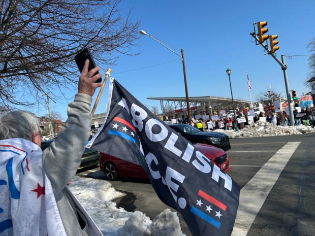 Protesters gather along Penn Avenue in Wyomissing for a demonstration in opposition to U.S. Immigration and Customs Enforcement. (Bill Uhrich - Reading Eagle)