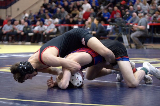 Tri-Valley's Owen Wolfgang wrestles North Schulkill's Gaige Mentusky at the District 11 Individual Wrestling Championships at Freedom High School in Bethlehem on Saturday, Feb. 21, 2022. (RYAN SHARP/STAFF PHOTO)