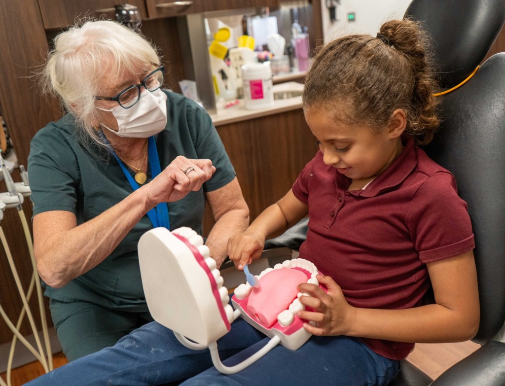 Public health hygienists at Wright Center educate kids about dental health