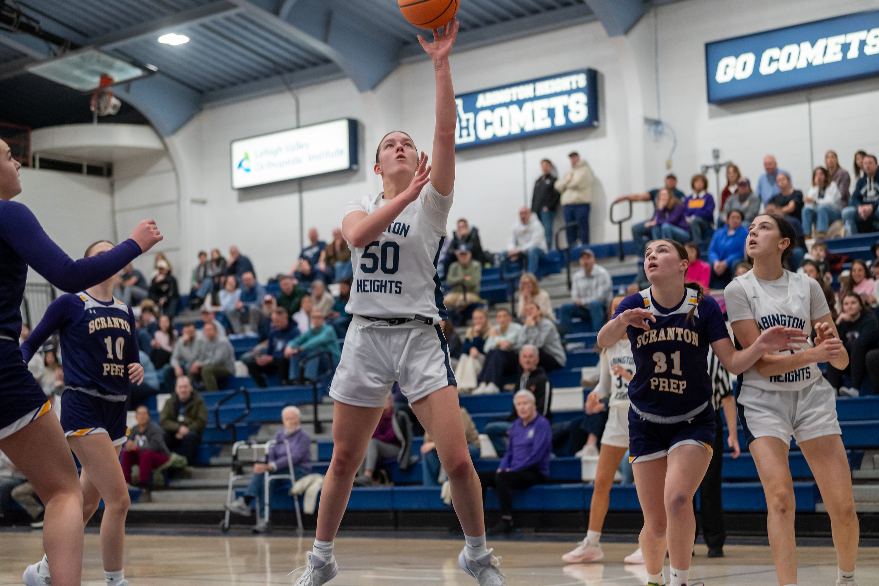 Abington Heights’ Sarah Cantner gies up for a basket during...