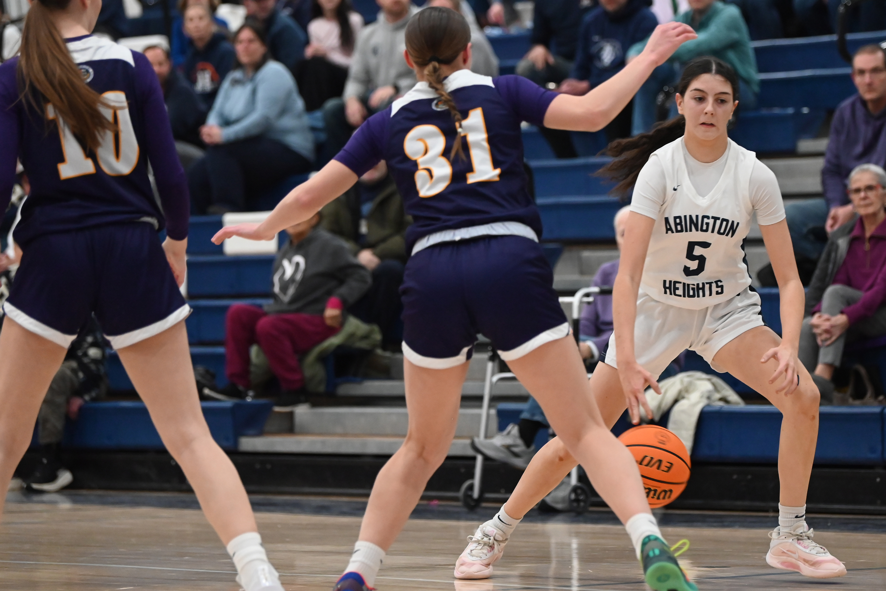 Scranton Prep’s Eva Kaszuba defends Abington Heights’ Emma Coleman during...