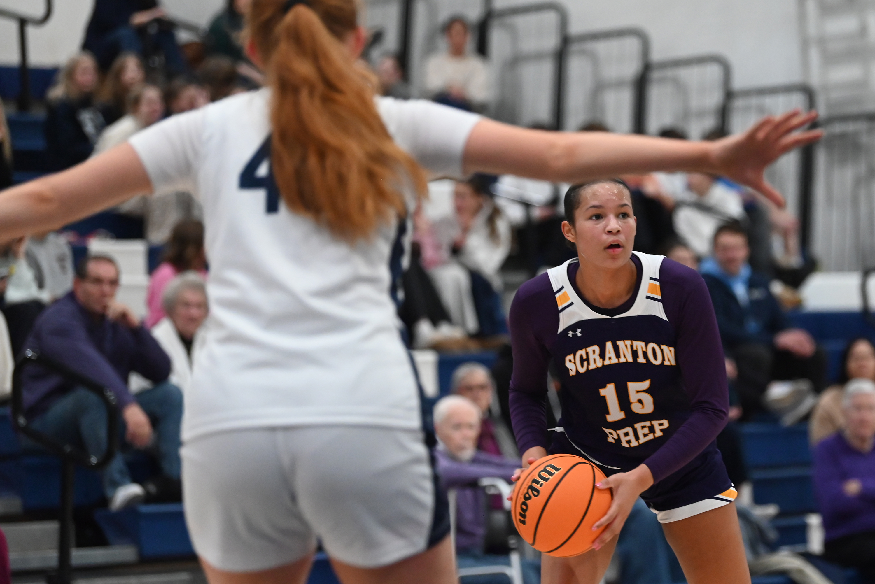Abington Heights’ Sydney Pallman defends Scranton Prep’s Kamyl Lynady during...