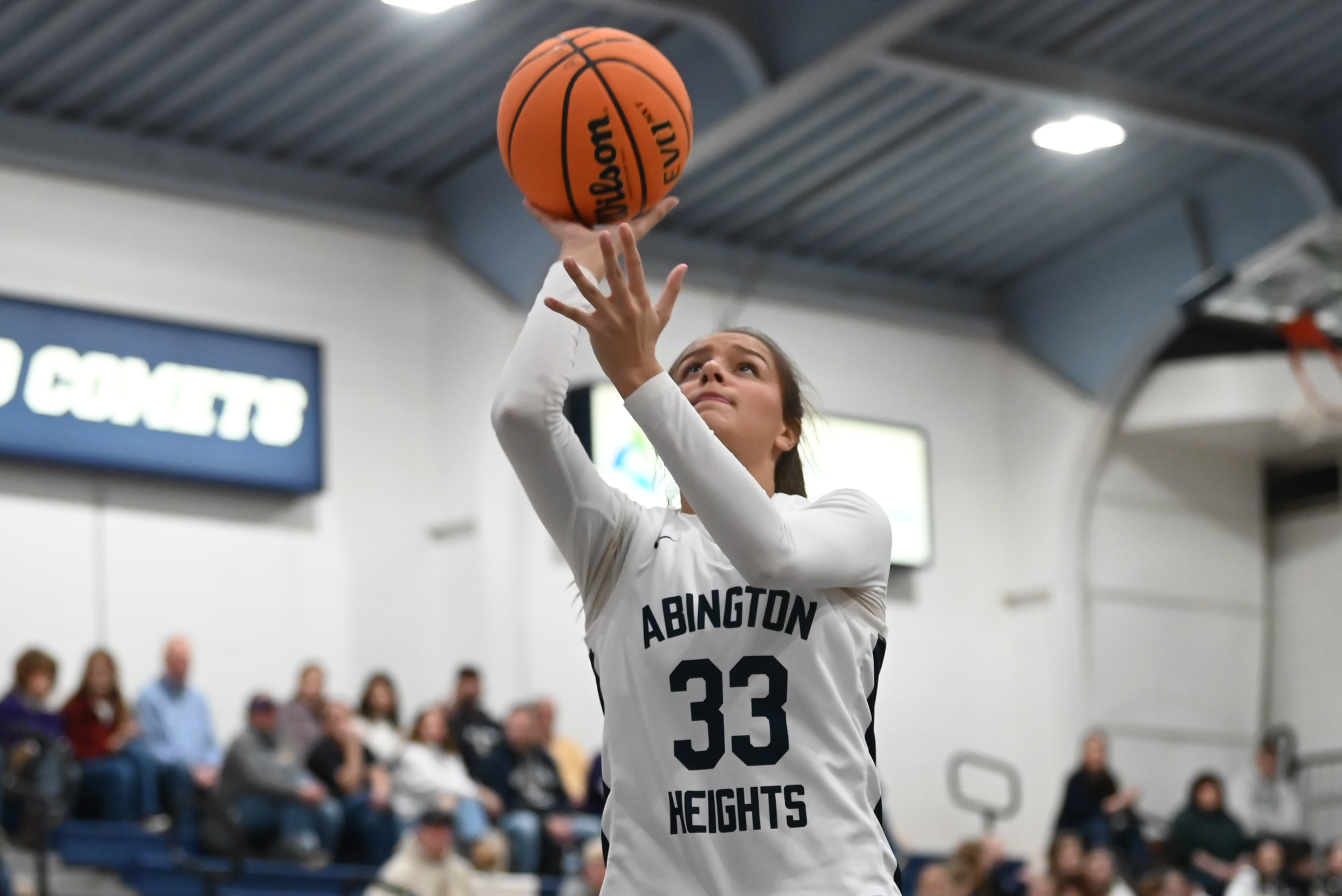 Abington Heights’ Lily Scoblick shoots during the basketball game against...