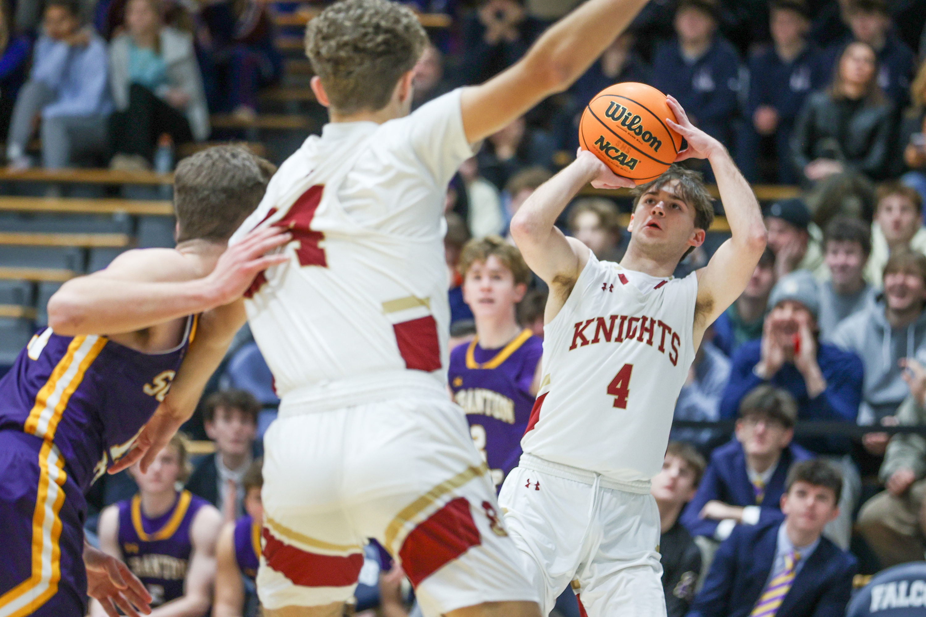 Scranton’s Tony Battaglia (4) takes a three-point during the 74th...