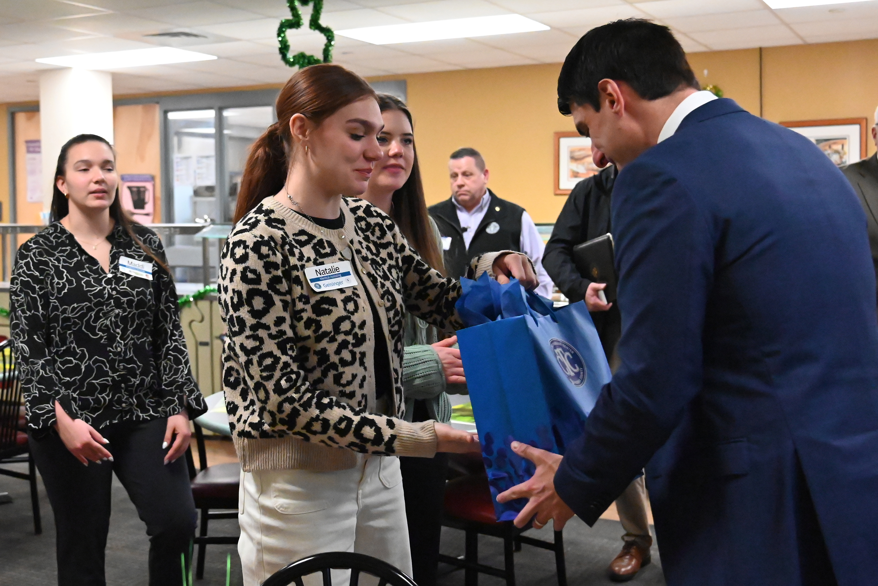 Mid Valley senior Natalie Giordano presents U.S. Rep. Rob Bresnahan...