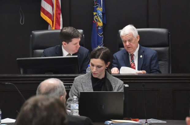 Lackawanna County Commissioners Bill Gaughan and Thom Welby confer during the commissioners' meeting at the county government center in Scranton Wednesday, February 18, 2026. (SEAN MCKEAG / STAFF PHOTOGRAPHER)