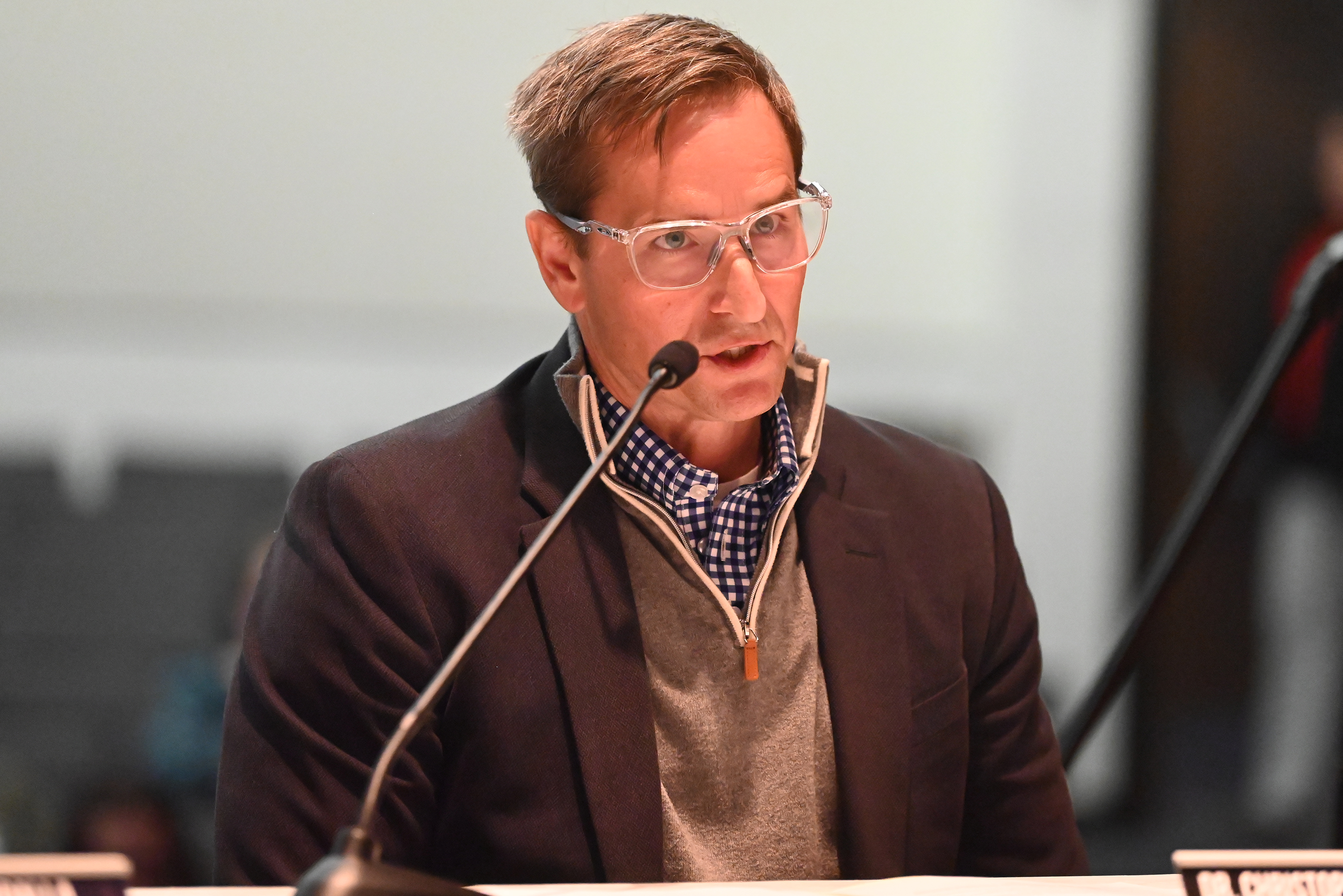 Abington Heights School District’s Superintendent Dr. Christopher Shaffer sits on...