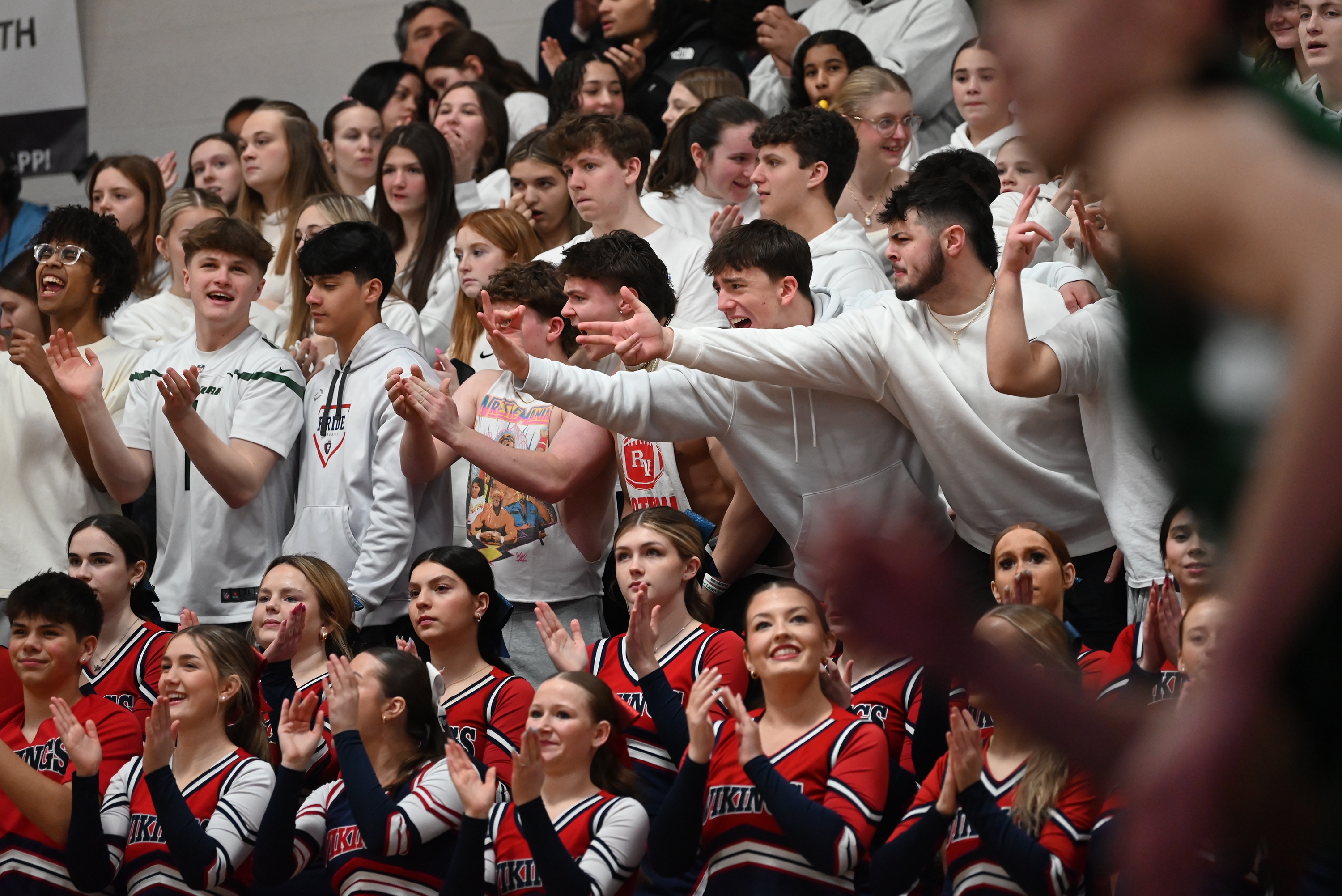 Riverside’s student section cheers on their team during the District...