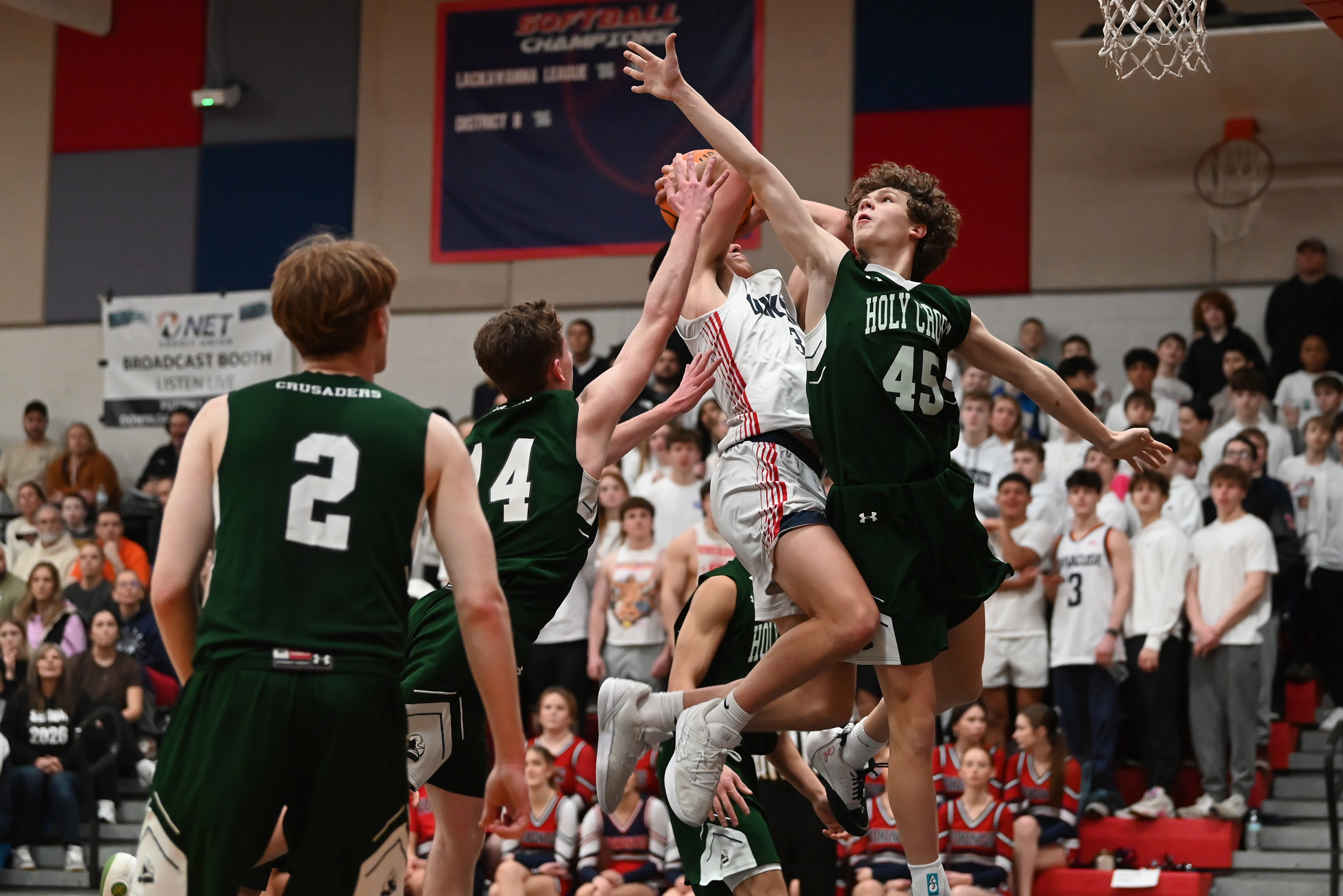 Holy Cross’ Thomas Gavin defends Riverside’s Nico Antoniacci during the...