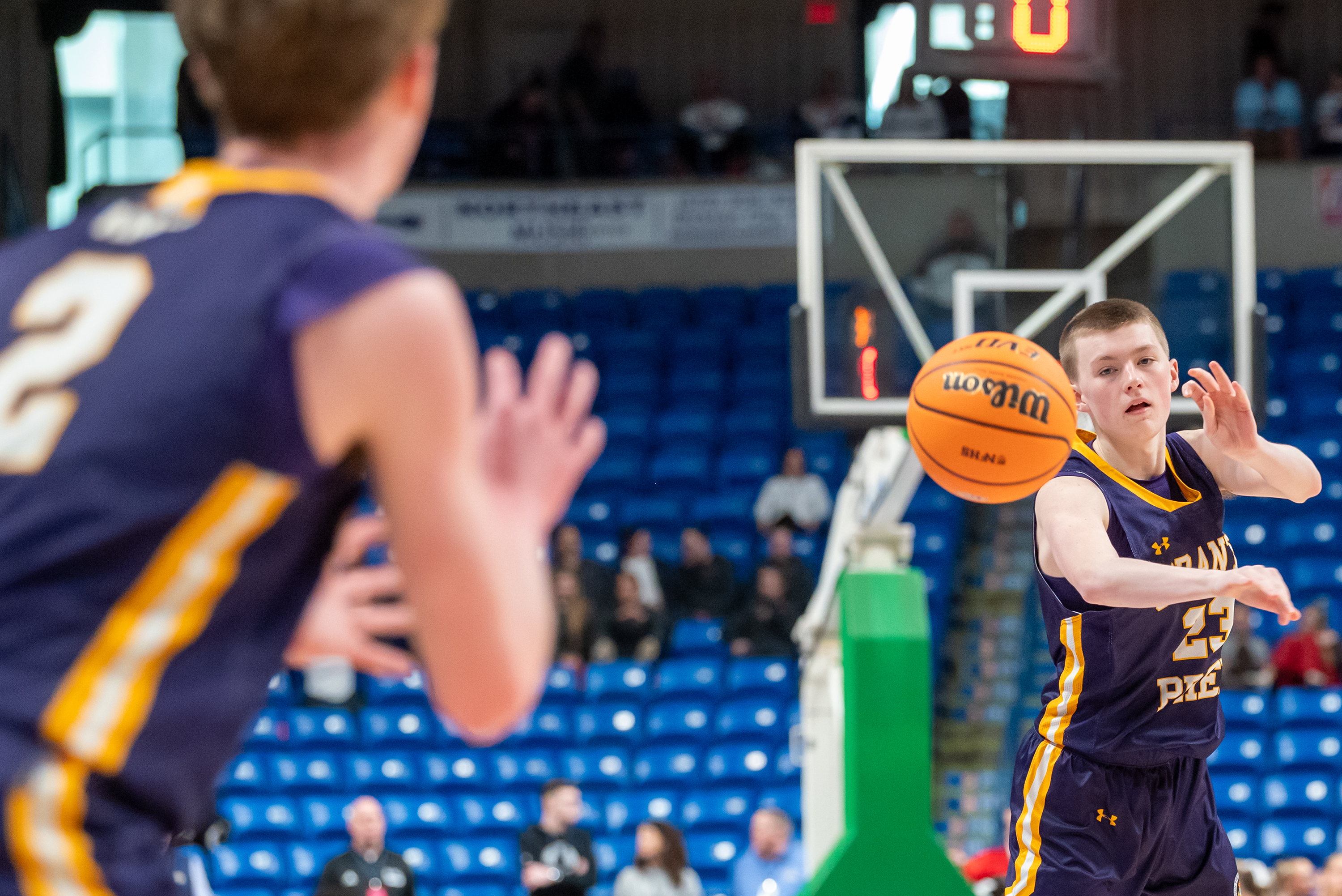 Scranton Prep’s Jimmy Doherty (23) pass the ball to teammate...