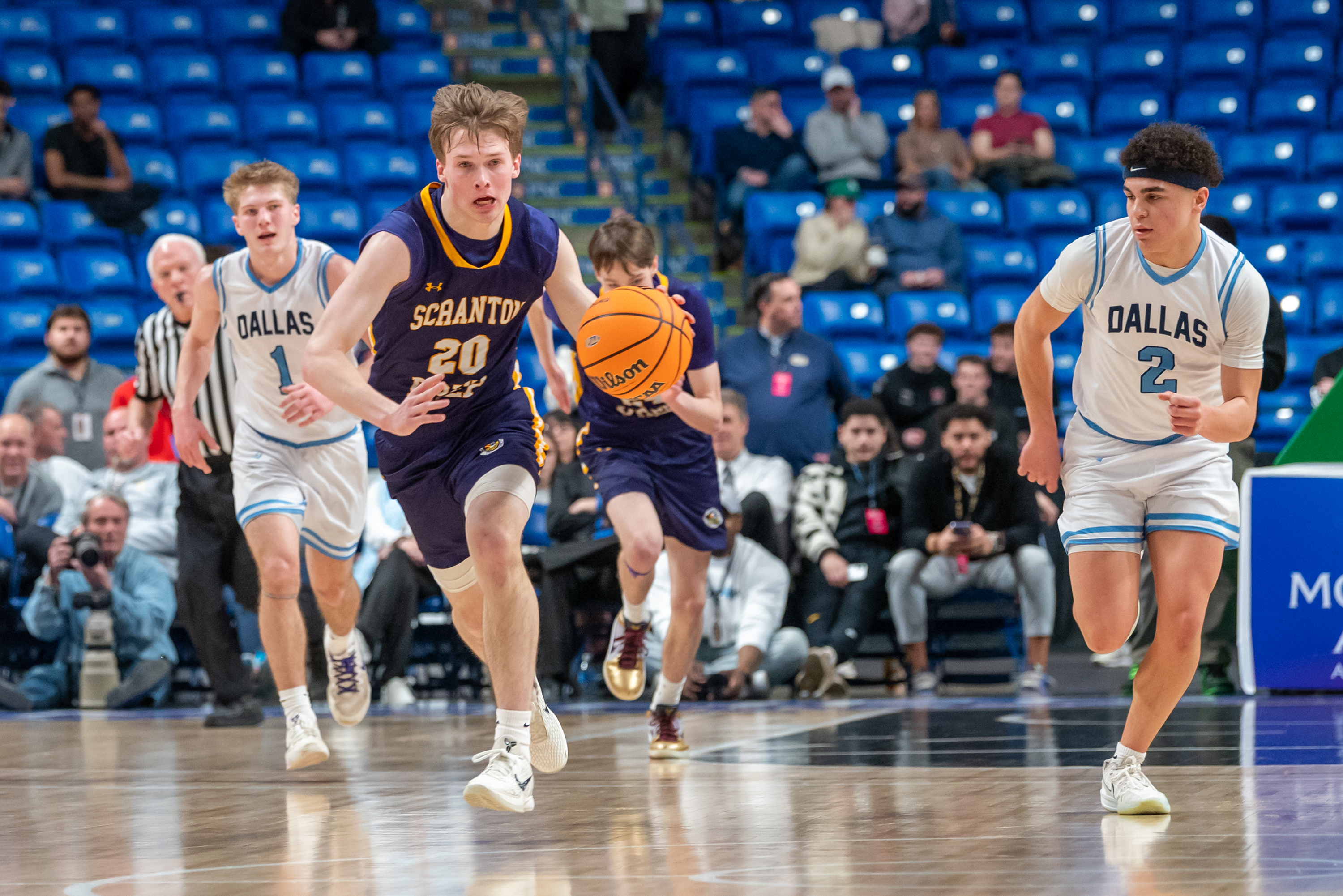 Dallas’ Tyce Mason follows Scranton Prep’s Packy Doherty during the...