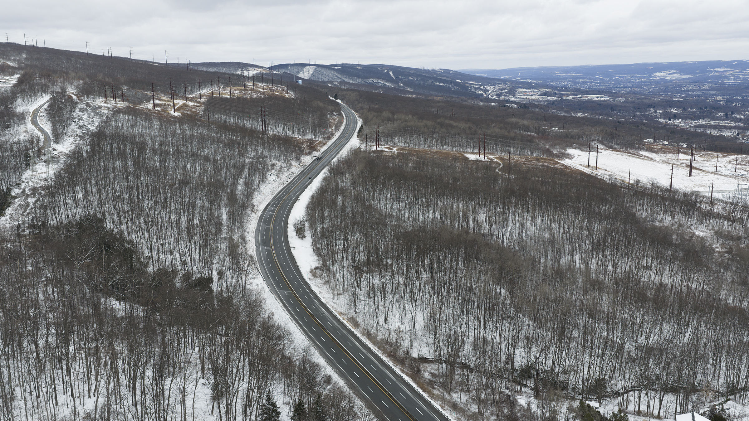 Newton Road in Scranton’s Keyser Valley winds down from the...