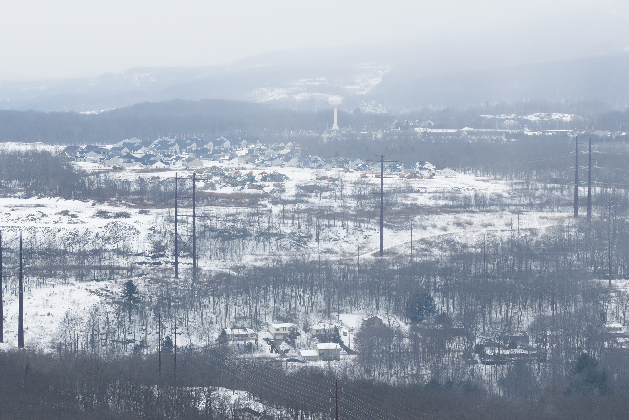 Power lines run through Archbald neighborhoods Friday, February 6, 2026....