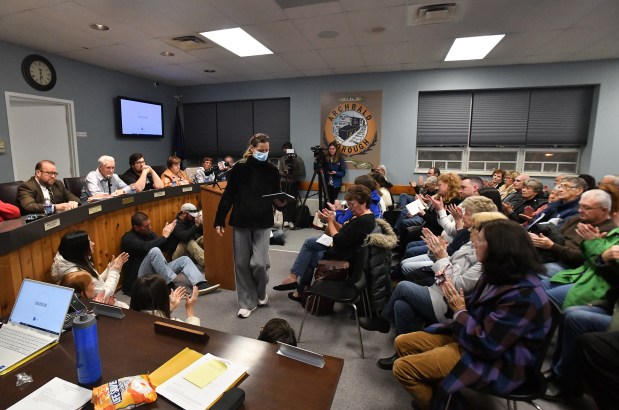 Borough resident Carolyn Mizanty concludes her comments at the podium during the data center meeting at the Archbald Borough Building in Archbald Monday, November 24, 2025. (SEAN MCKEAG / STAFF PHOTOGRAPHER)