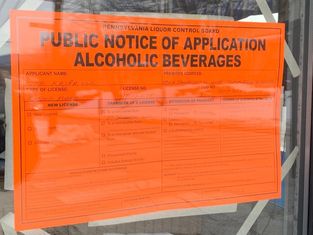 The former Dutchie's, whch opened in 2021 in the former Brunetti's on Sanderson Avenue at Deacon Street in the Green Ridge section of Scranton, closed in November of 2025. Photo taken Feb. 9, 2026 shows a PLCB placard in the window for a change of ownership of the liquor license there to a new owner, One Kripa LLC. (JIM LOCKWOOD / STAFF PHOTO)