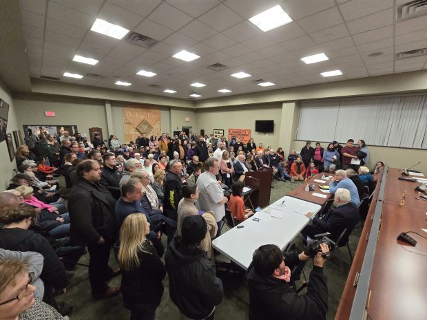 An overflow crowd of at least 200 residents packs into the Dickson City Borough Building for a public hearing Tuesday, Jan. 20, 2026, in the Dickson City. (FRANK WILKES LESNEFSKY / STAFF PHOTO)