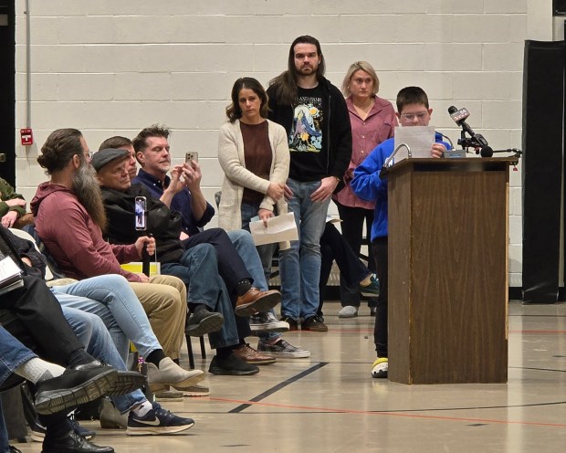 Dickson City resident Carter Szescila, 10, worried how data centers could impact other children during a public hearing at the Dickson City Civic Center on Thursday, Feb. 12, 2026. (FRANK WILKES LESNEFSKY / STAFF PHOTO)