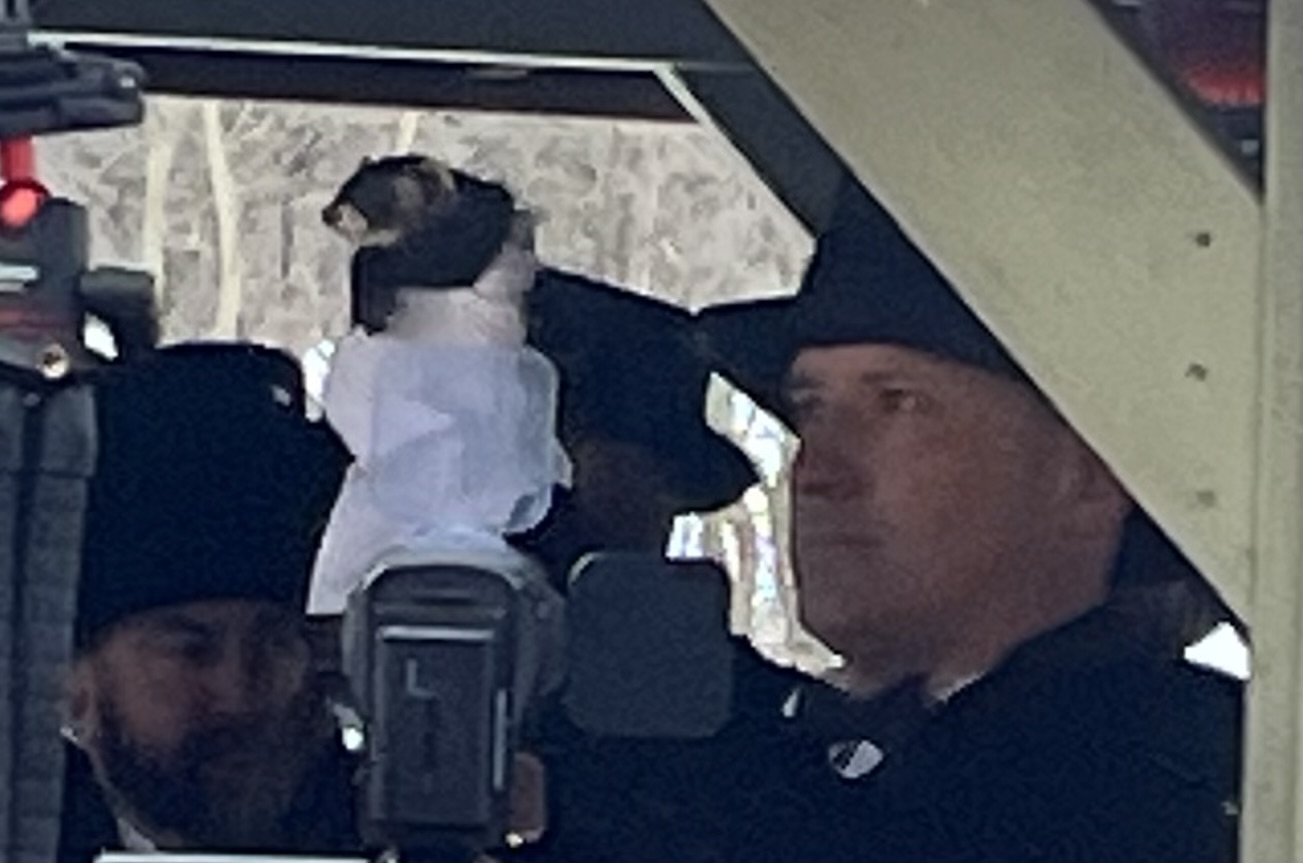 James “Jessup Jim” Salus, official ferret handler, holds up Jessup...