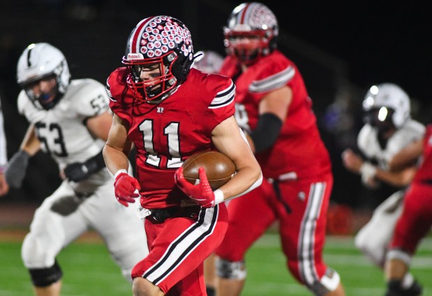 North Pocono's Cole West runs for a touchdown in the end of the first quarter against Delaware Valley at Trojan Stadium in Moscow Friday, Oct. 17, 2025. (SEAN MCKEAG / STAFF PHOTOGRAPHER)