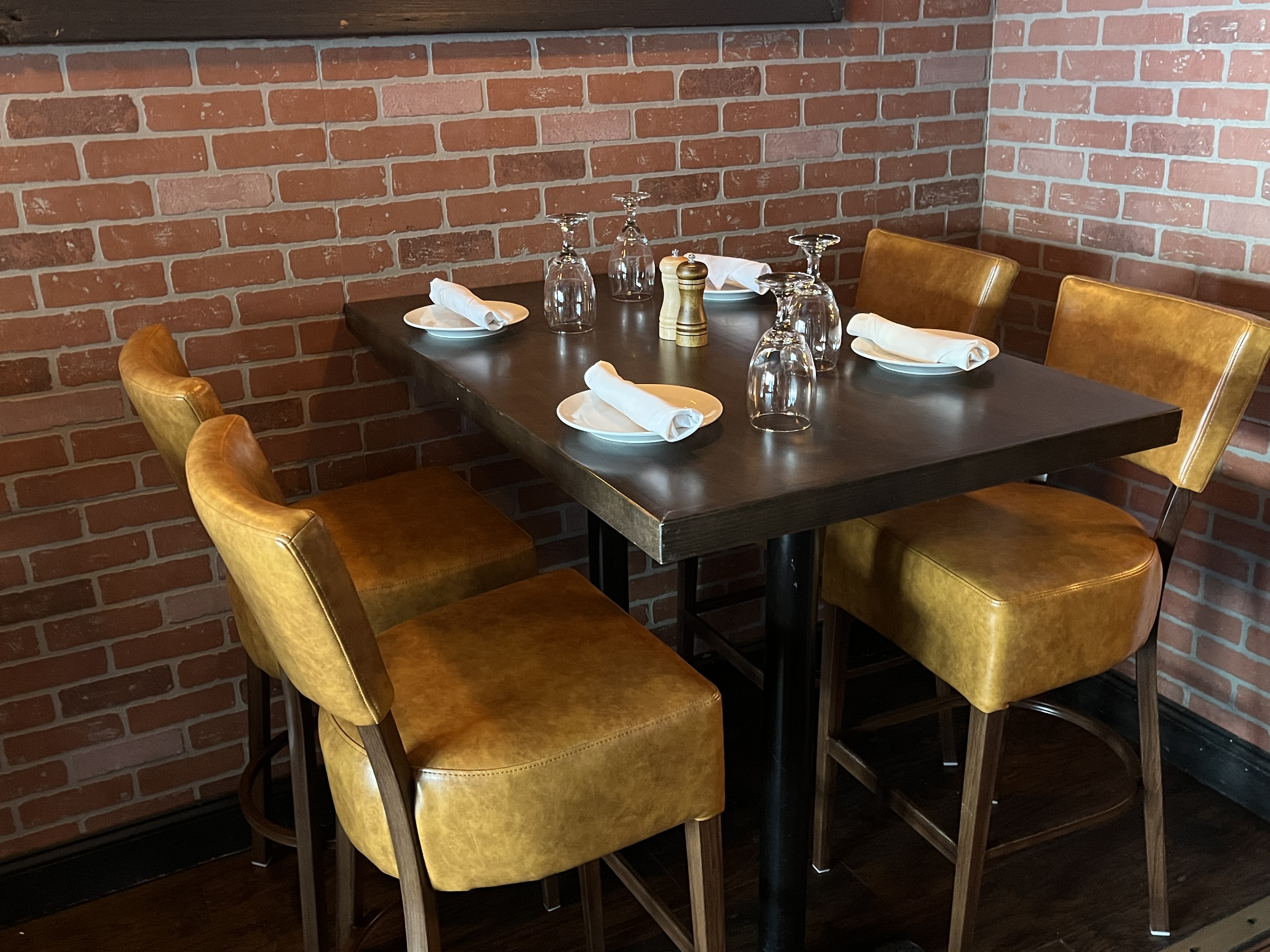 A table inside the bar area of Italian Pub Meatball...
