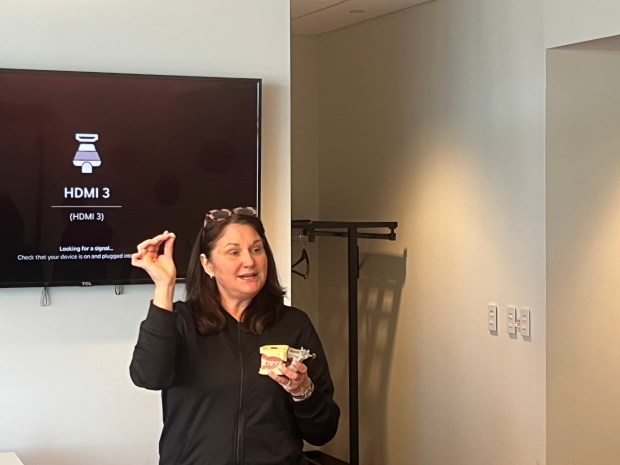 Sharon Langan discusses the NEPA Dental Assisting School's 12-week program which provides an introduction into dentistry with eight-grade students from Abington Heights Middle School at the Scranton Enterprise Center on Wednesday, Feb. 4, 2026. (ROBERT TOMKAVAGE/STAFF PHOTO)