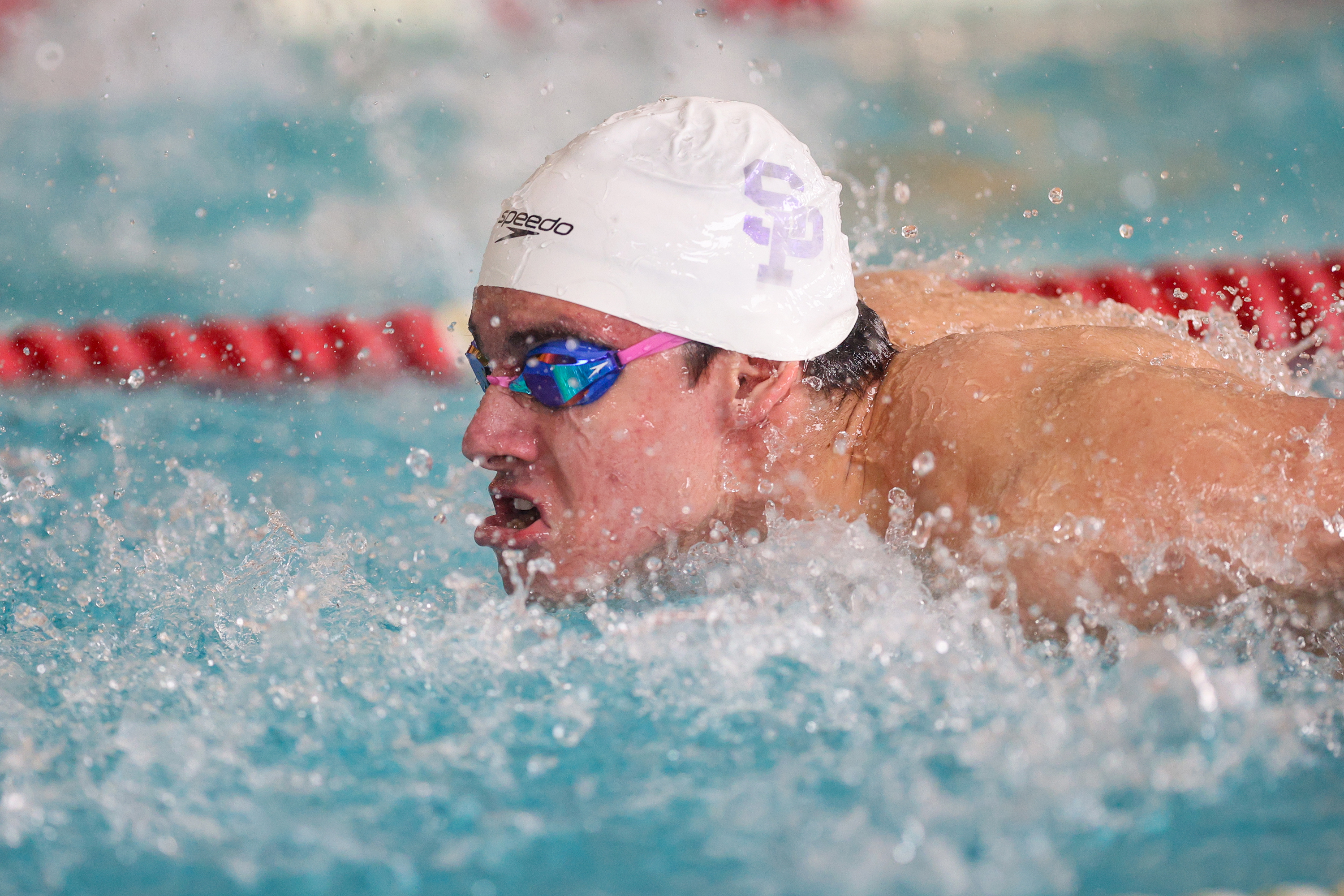 Scranton Prep’s Lukas Iannone swims the butterfly leg of the...