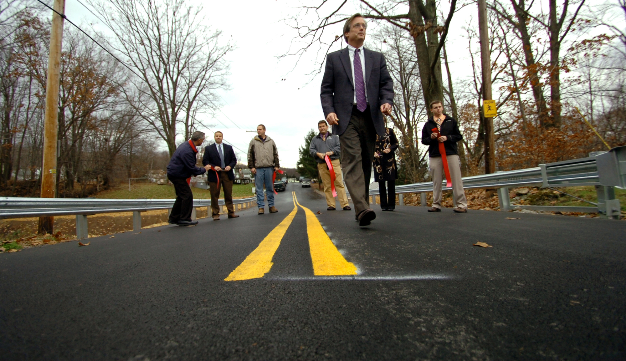 Scranton Mayor Chris Doherty walks the line of the new...