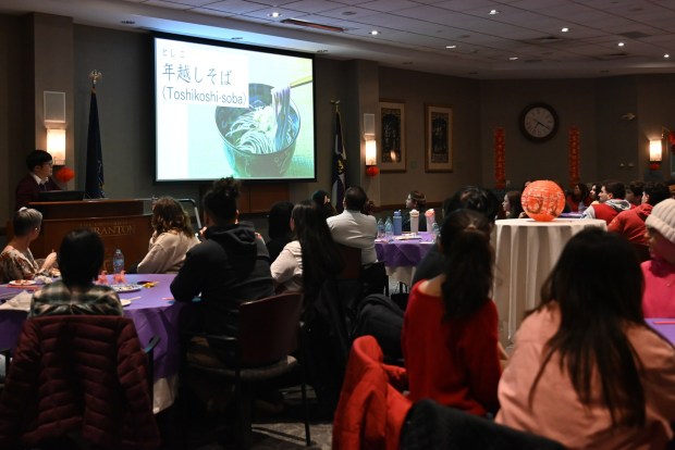 Attendees listen to a presentation on Japanese New Years traditions during the Asian New Year Festival and Workshop at the University of Scranton on Thursday, Feb. 19, 2026. (REBECCA PARTICKA/STAFF PHOTOGRAPHER)