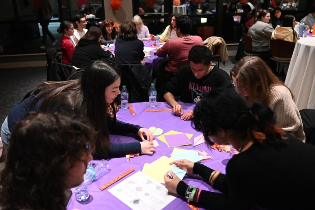 Attendees work on origami horses and hearts during the Asian New Year Festival and Workshop at the University of Scranton on Thursday, Feb. 19, 2026. (REBECCA PARTICKA/STAFF PHOTOGRAPHER)