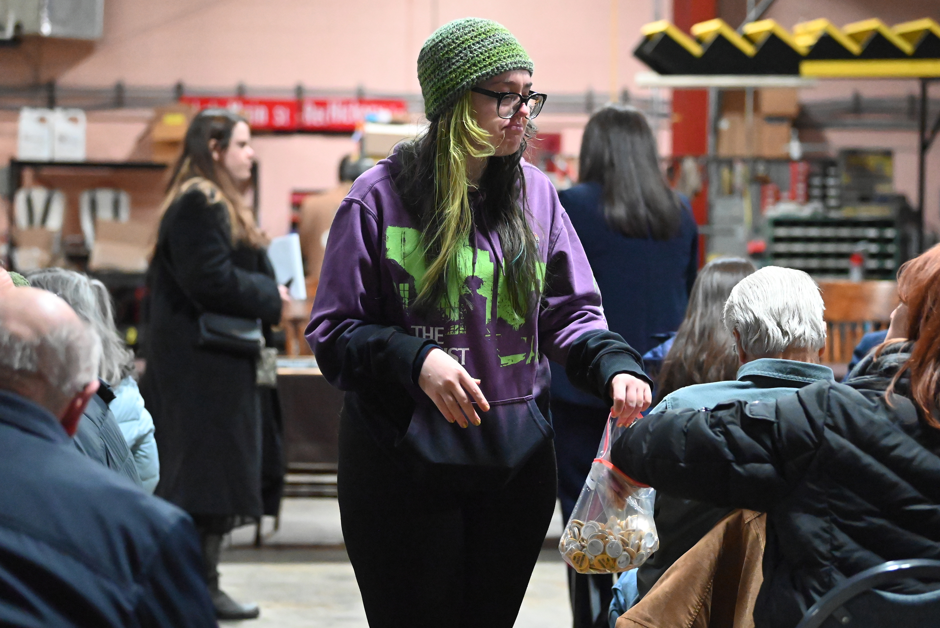 Keyser Valley resident Hayley Schaffer hands out “No Data Centers”...