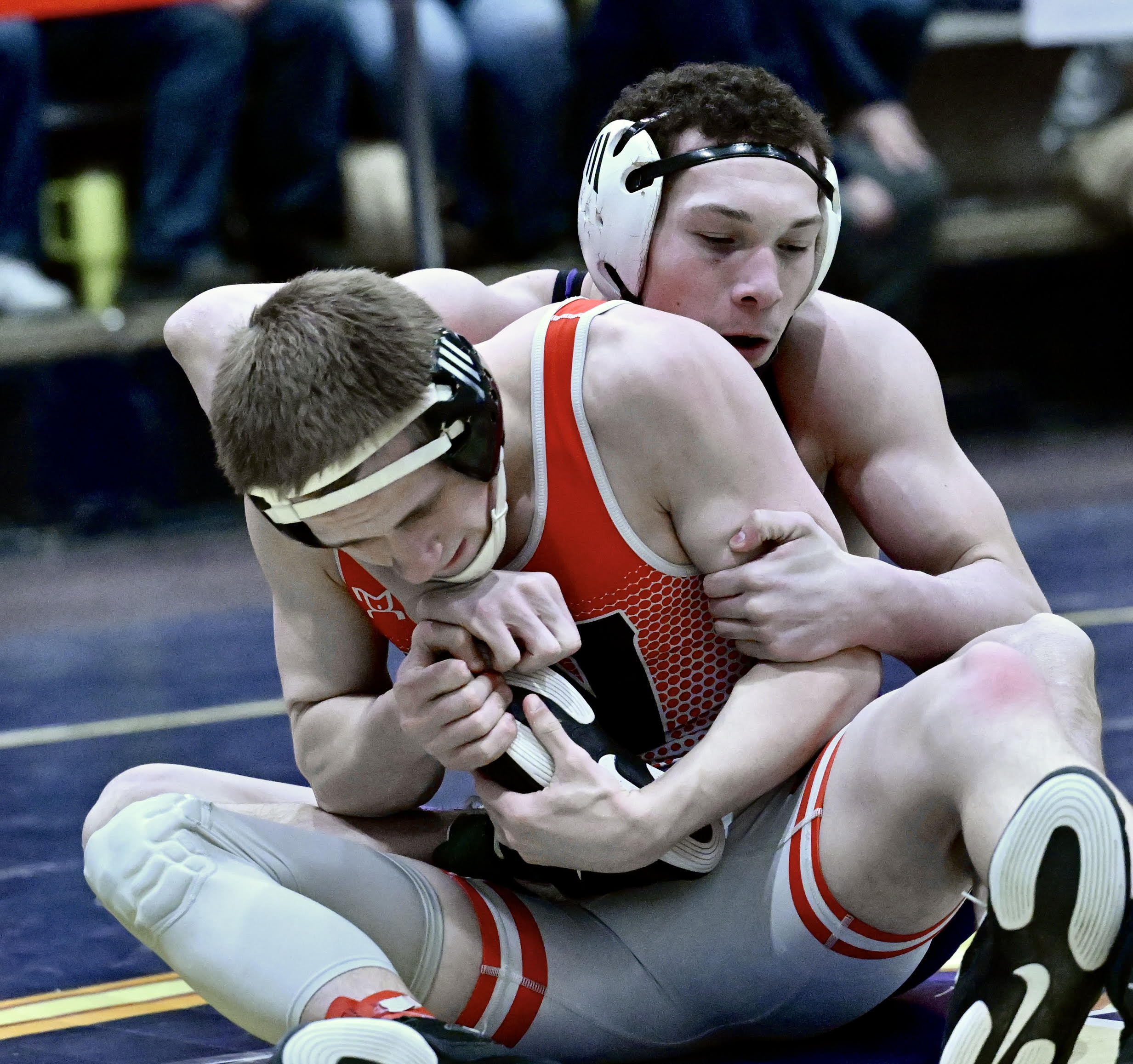 Wallenpaupack’s Tristan Braxton, back, wrestles Williamsport’s Austin Dunlap in the...