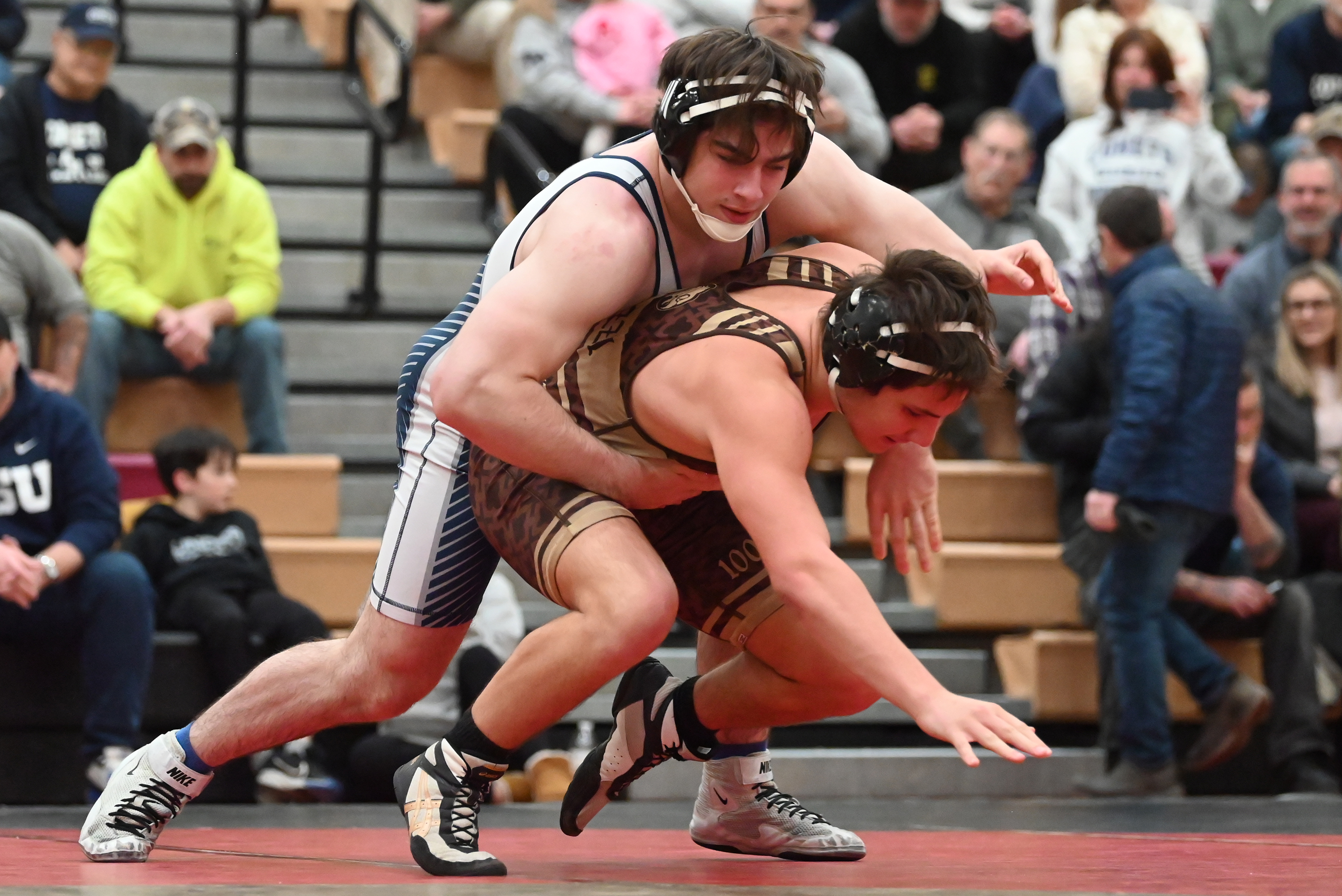 Abington Heights’ Frank Scialpi, top, competes against Bethlehem Catholic’s James...