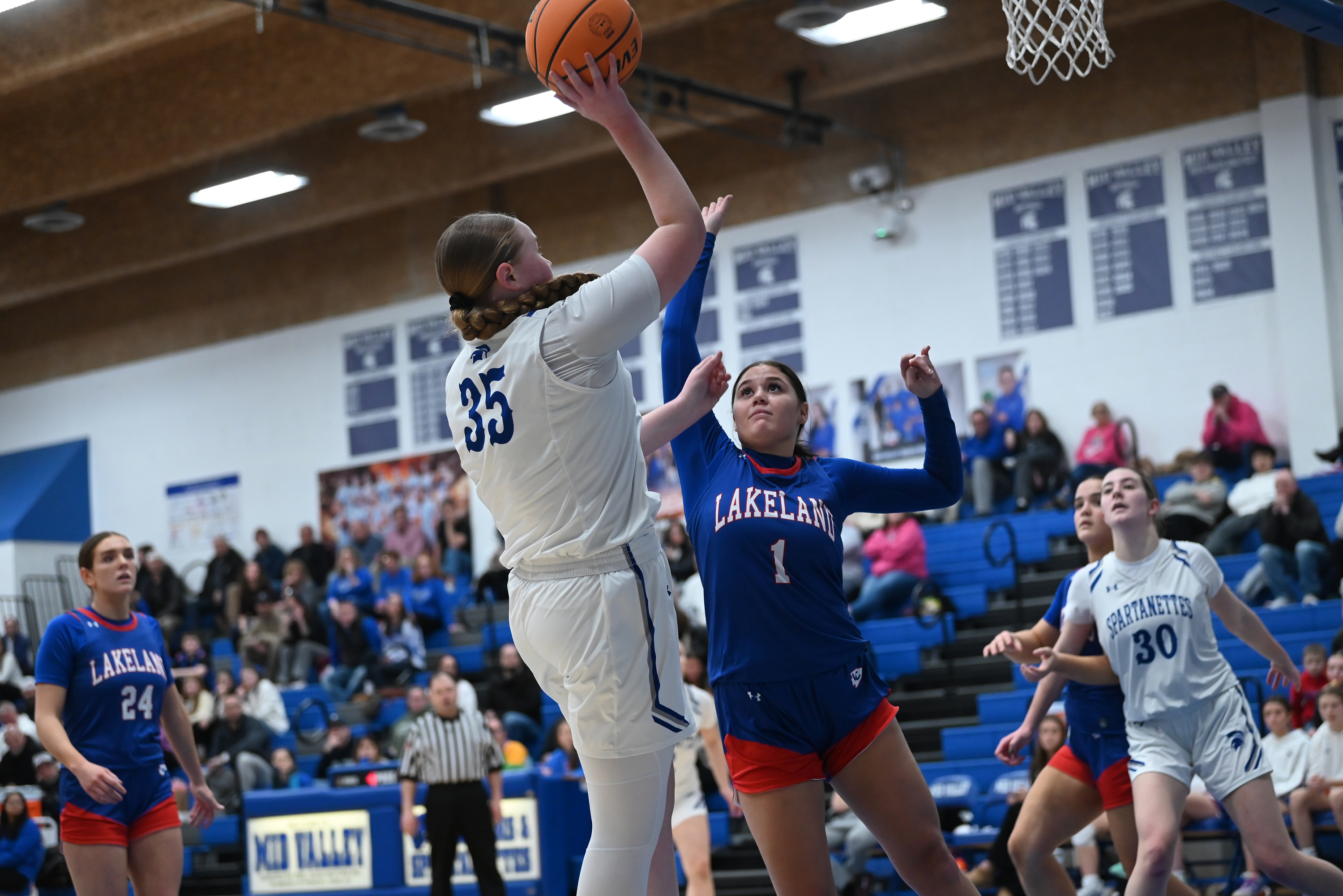 Lakeland’s Reina Walters defends Mid Valley’s Mackenzie Richards during the...