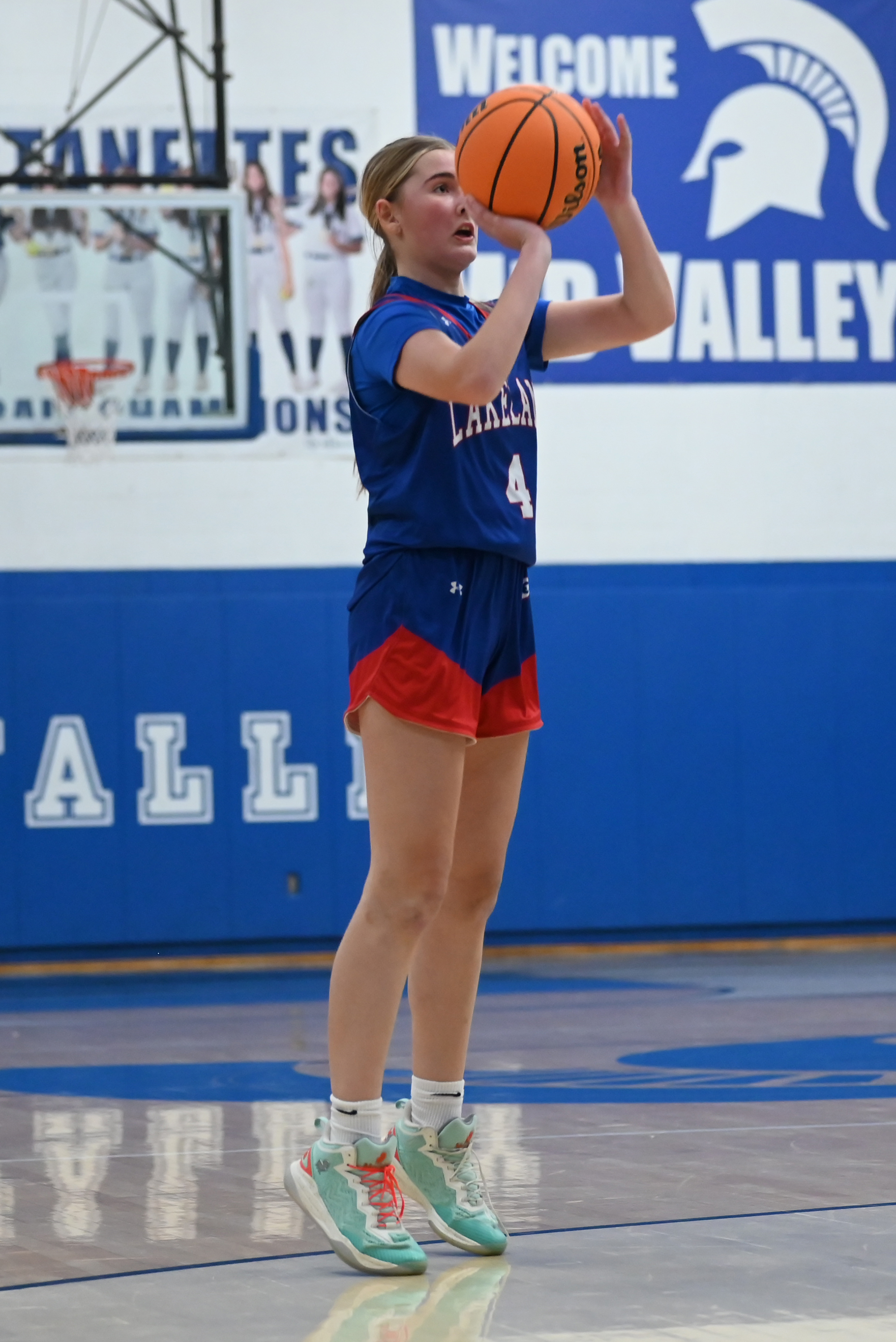 Lakeland’s Olivia Beier shoots during the basketball game at Mid...
