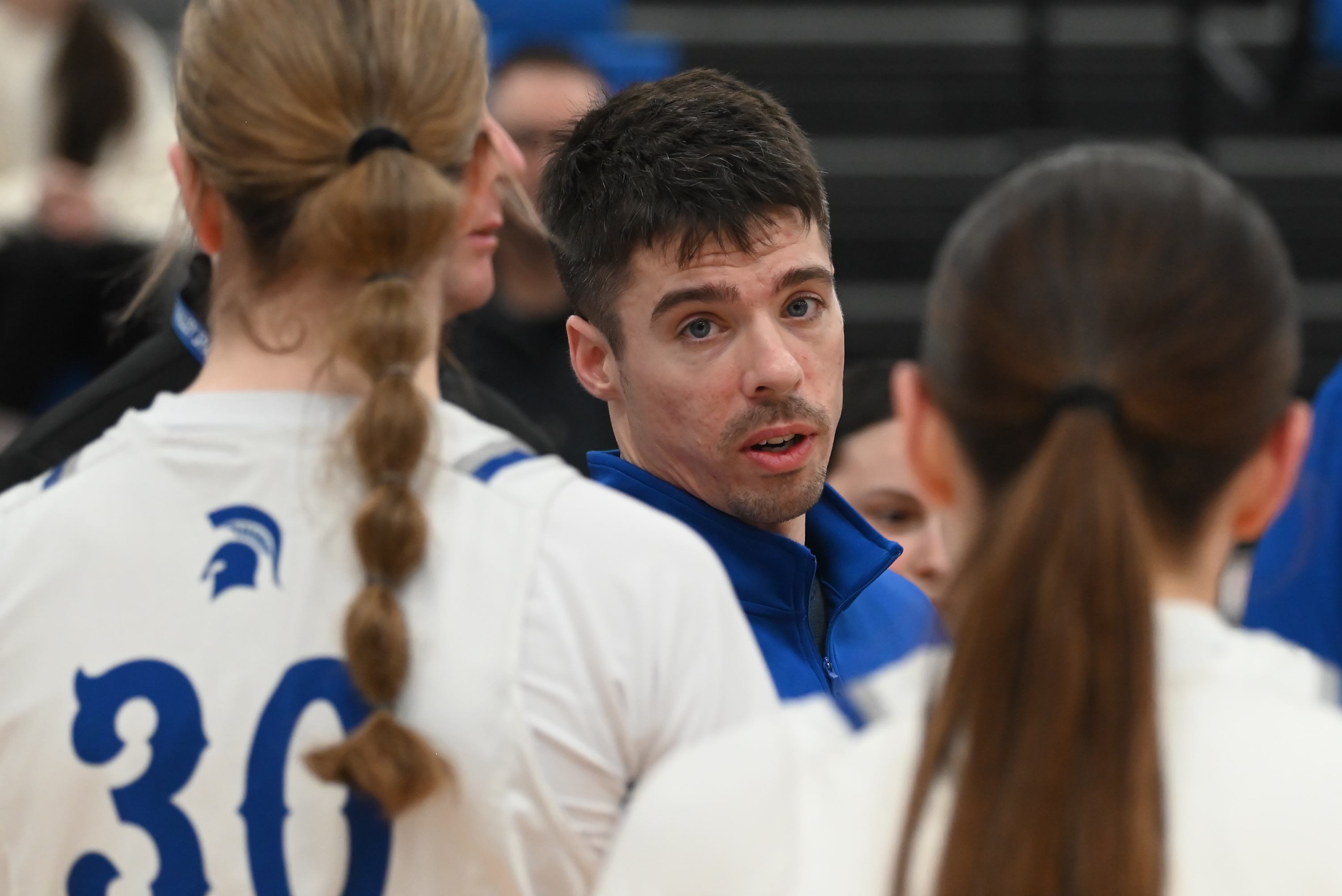 Mid Valley head coach Stephen Hooper talks to his players...