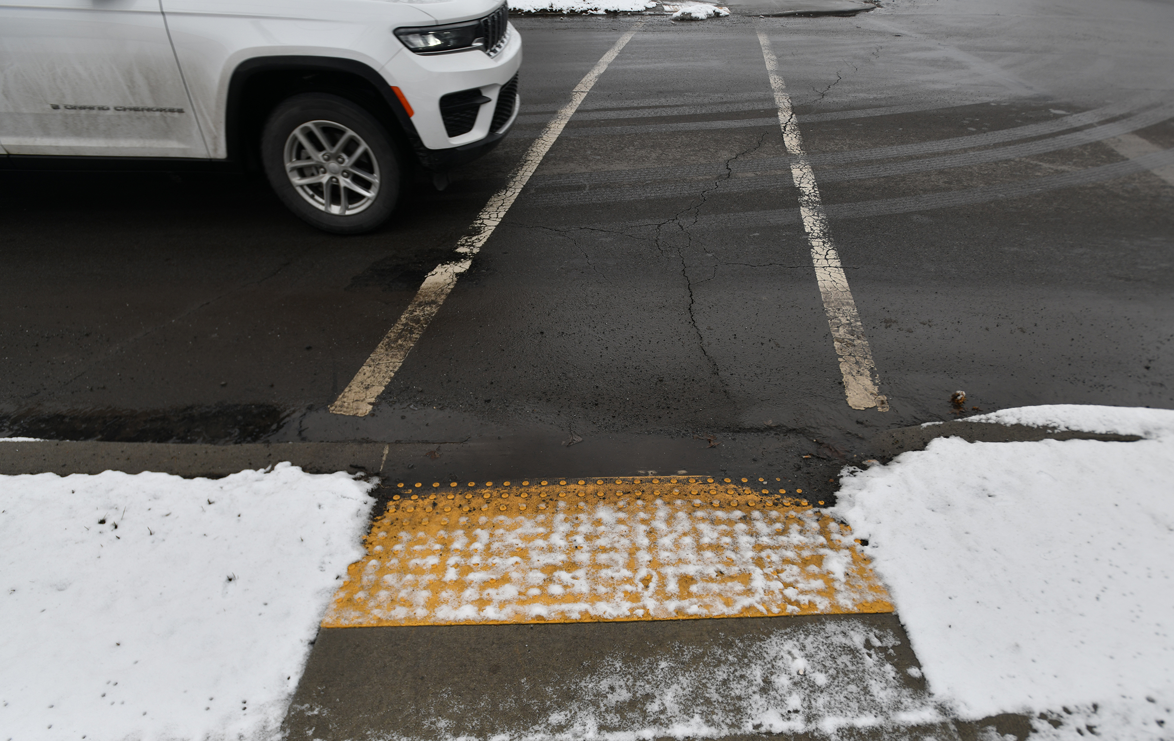 A vehicle passes over a crosswalk Main St. in Moosic...