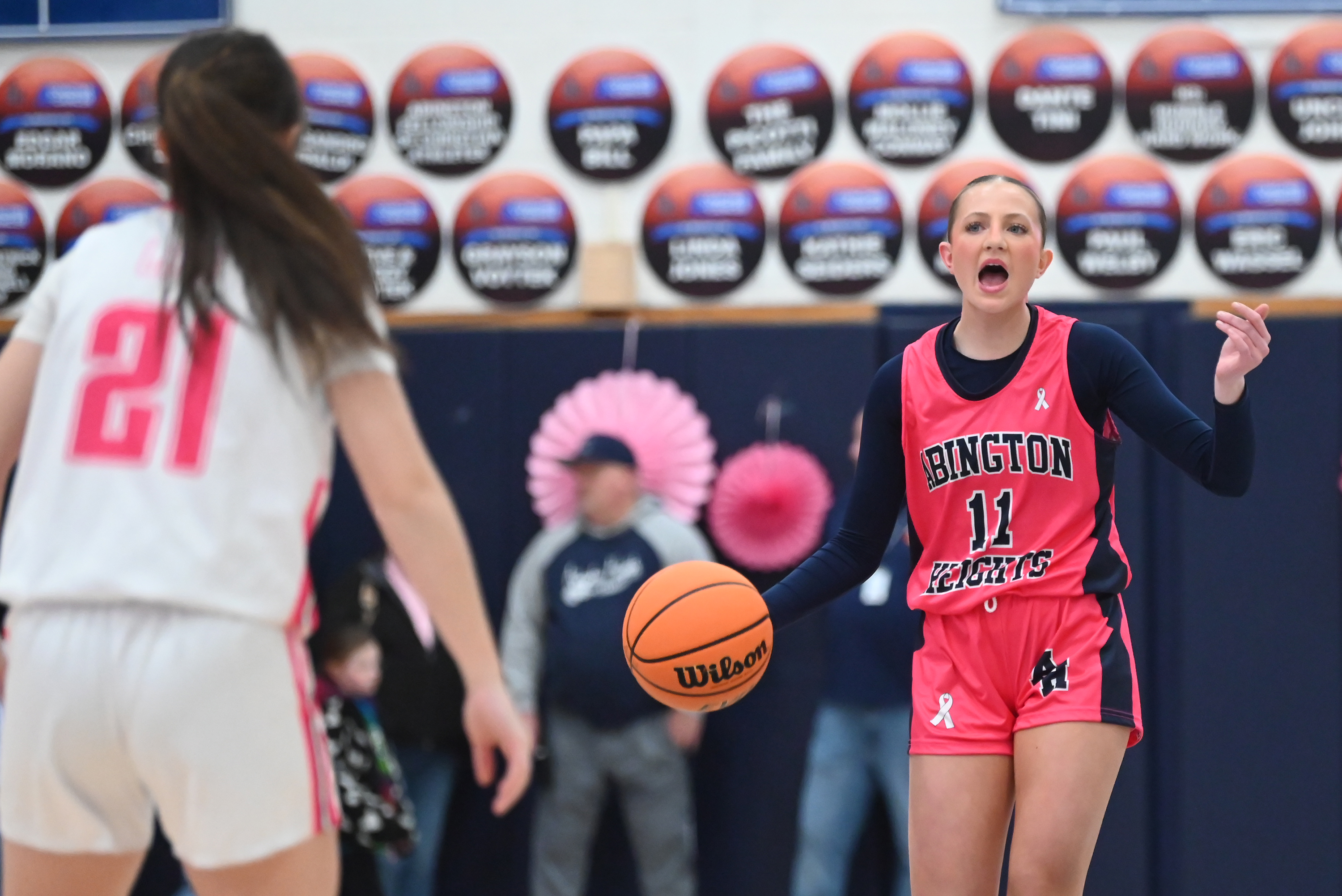 Abington Heights’ Abby Schneider calls out a play to her...