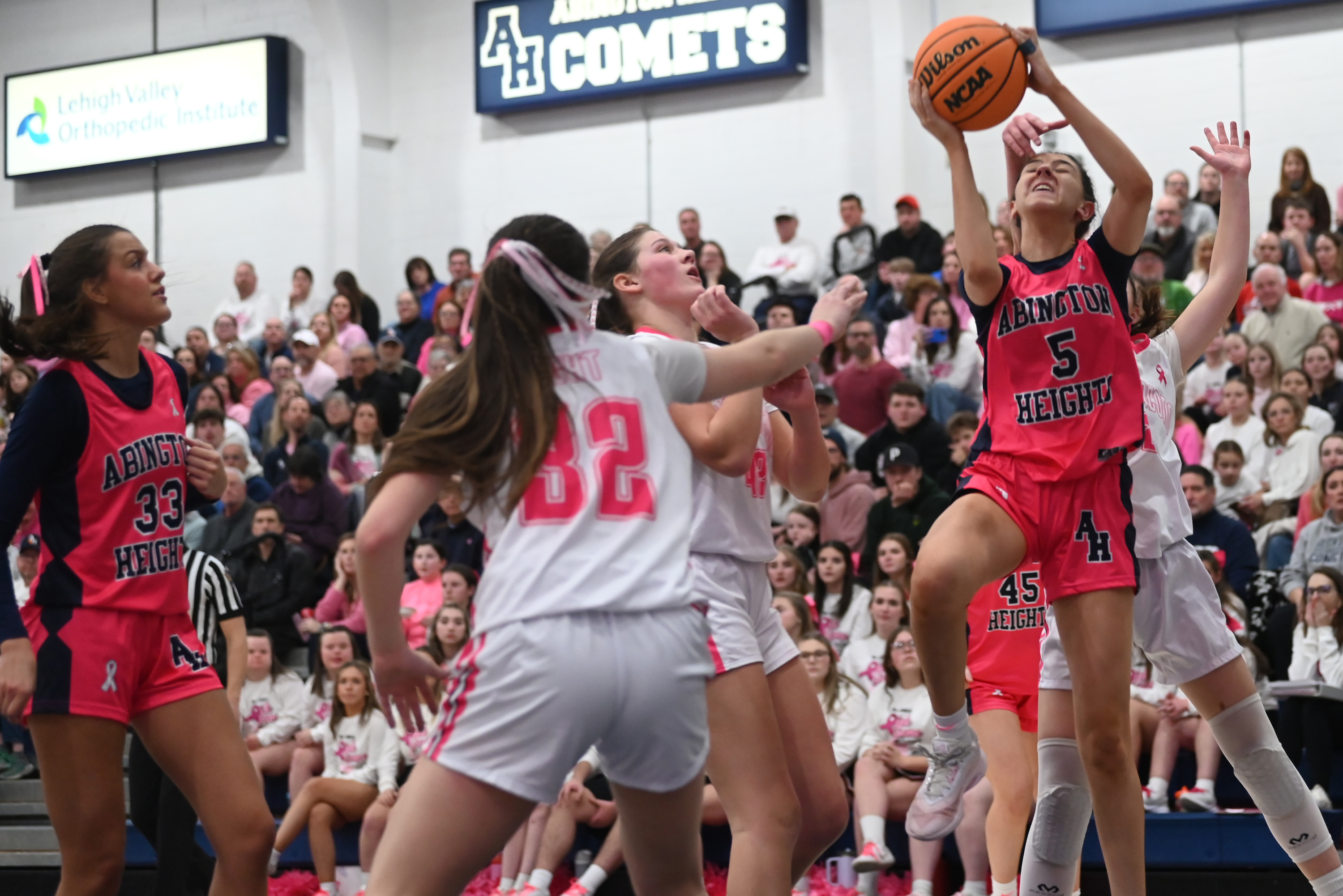 Abington Heights’ Emma Coleman leaps toward the hoop during the...