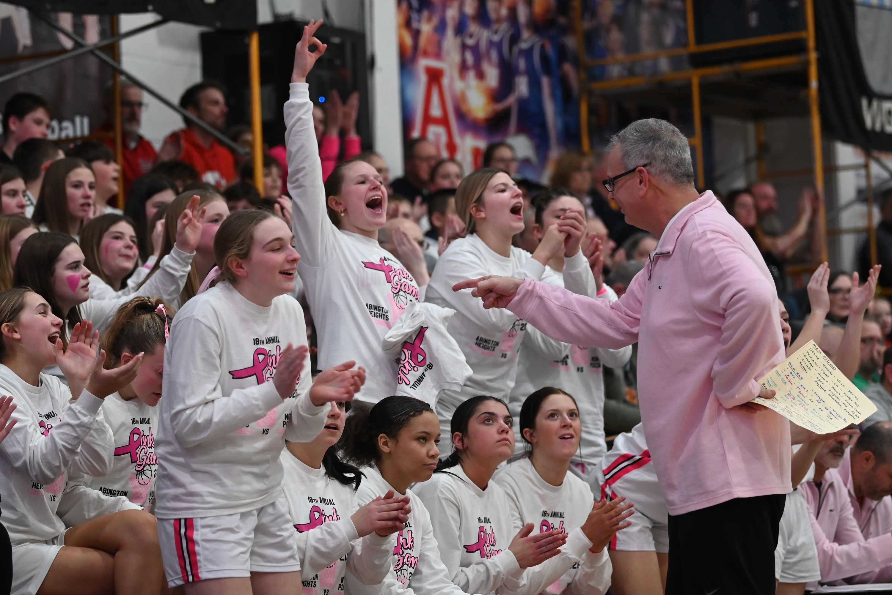 The North Pocono bench celebrates after their team scores during...